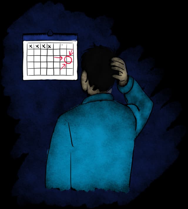 Homme regardant un calendrier